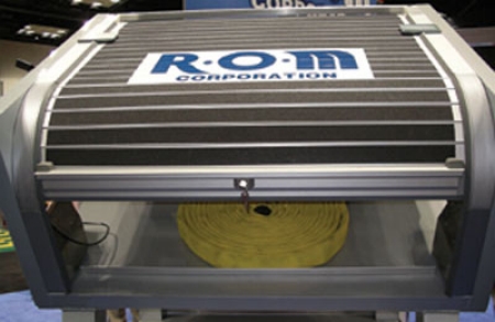 R•O•M makes covering the hose bed simple, safe and easy. A flip of the switch, and the motorized cover opens or closes.  (Fire Apparatus Photo by Robert Tutterow)