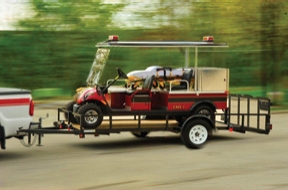 A tractor-drawn aerial can block several lanes of traffic and carry lots of tools.