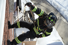 (3) Lion's personal rescue system comprises a Class II harness in bunker pants, a tether, a descent control device, a hook or carabiner anchor, and 50 feet of rope.