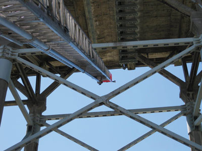 (3) The aerial operator has aligned the aerial ladder with the center, top triangle of the bridge.