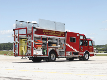 (4) E-ONE built a hazmat unit that includes a command and communications center behind the crew cab for the Birmingham (AL) Fire Department.