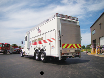 (5) The emergency response hazmat unit that Pierce Manufacturing built for the Union Pacific Railroad has a lift gate at the rear to allow off-loading and on-loading of pumps and hose platforms used to contain spills from tank cars.