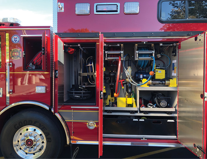 Both the D5 and P5 compartments hold two hydraulic hose reels with 100-feet of dual hose, along with Genesis spreaders, cutters, rams, and a combi tool. 