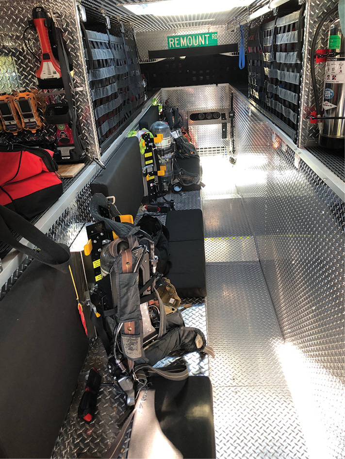 The interior of the walk-in section of the technical rescue seats five self-contained-breathing-apparatus-outfitted firefighters. 