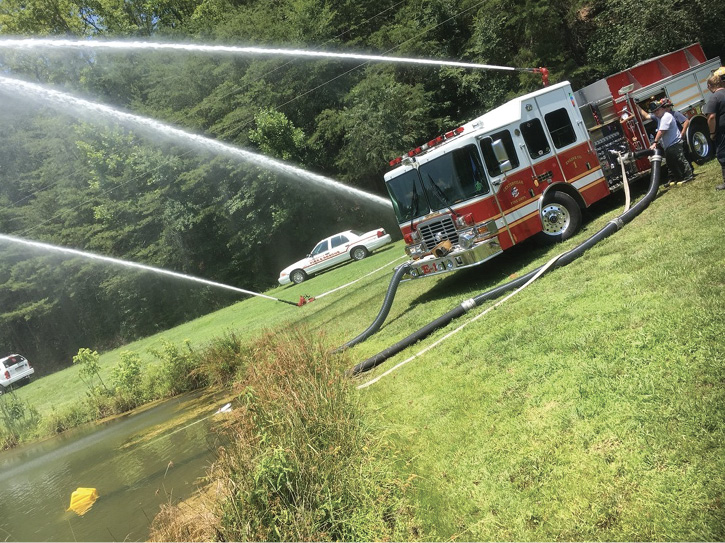 A fill site engine flowing its rated pump capacity using the Twin Tube Setup in the rural environment.