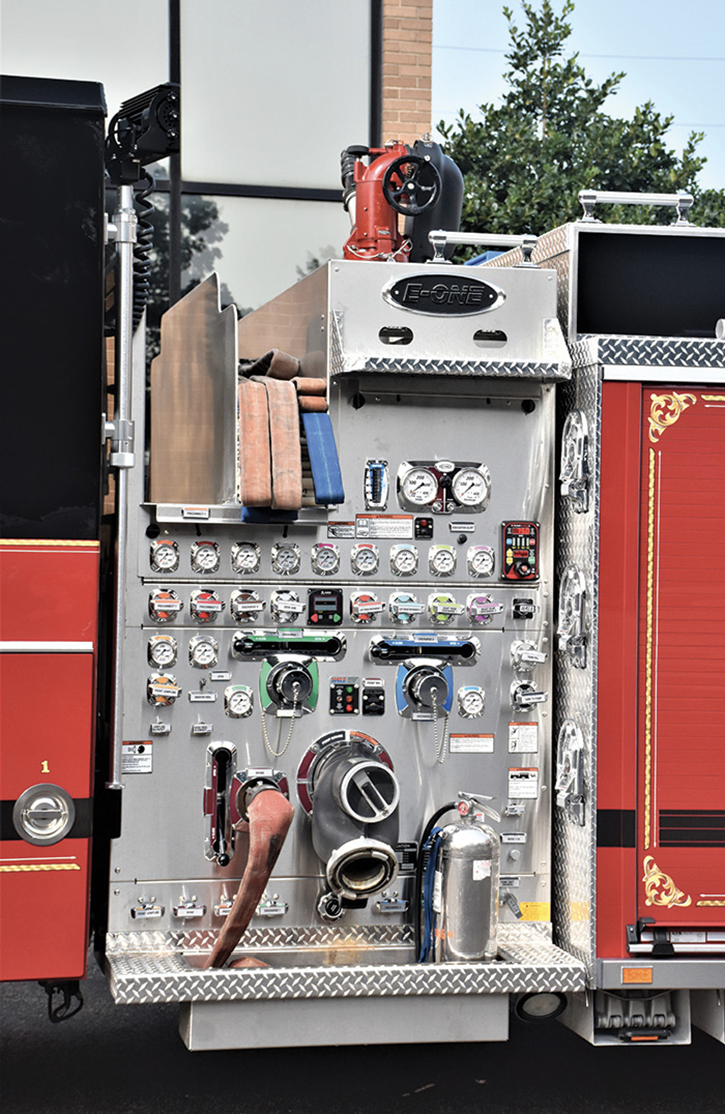 The pumpers feature simple pump panels with deluge guns above.