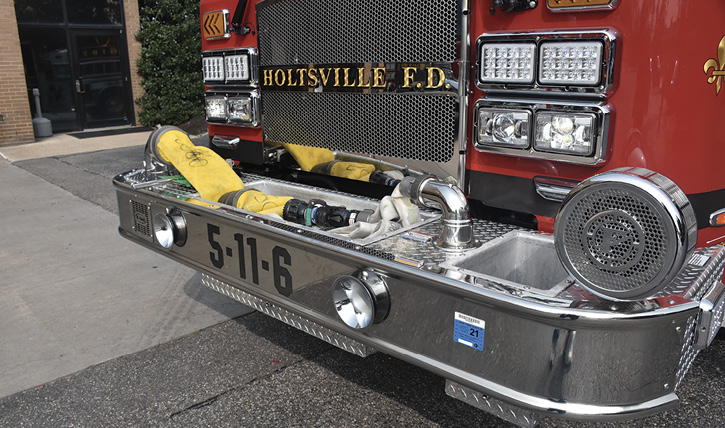 The extended front bumper with five-inch LDH hydrant hookup and 1¾-inch trash line. 