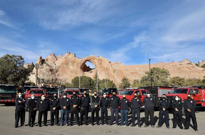 Navajo Nation officials and firefighters