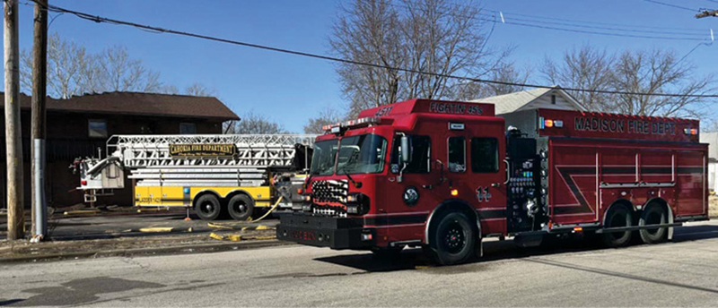 Madison’s pumper-tanker operating at an apartment building structure fire call.