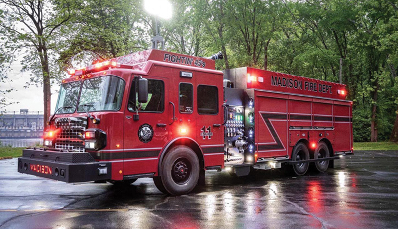 The Madison pumper-tanker has a 2½-inch discharge in its extended front bumper and two 1¾-inch speedlays and one 2½-inch crosslay above the pump module.