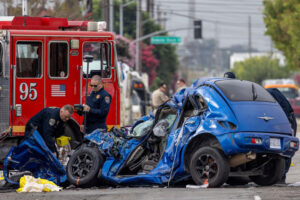 WEST RANCH DOMINGUEZ, CA - SEPTEMBER 05: Multidisciplinary Accident Investigation Team at the scene of a double fatal crash involving a Los Angeles County fire truck and sedan at the intersection of South Avalon Boulevard and East Compton Boulevard in West Ranch Dominguez, CA. (Irfan Khan / Los Angeles Times)